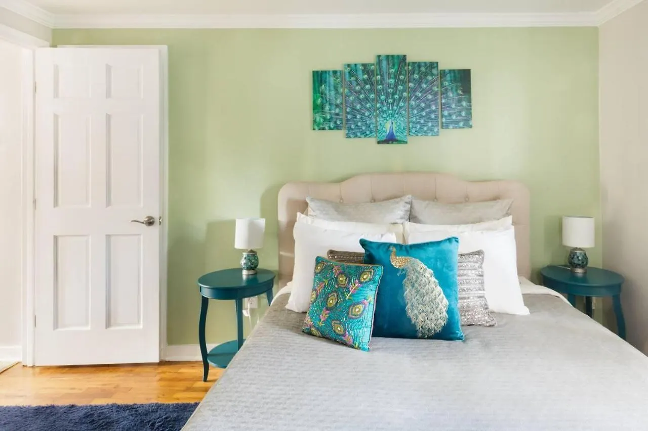 Vibrant, Colorful Condo Building With Backyard Firepit And Games Savannah Apartment